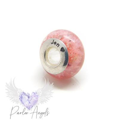 pink engraved ashes cremation bead with heart emoji, arial font. Fairy pink resin sparkle mix with cremains