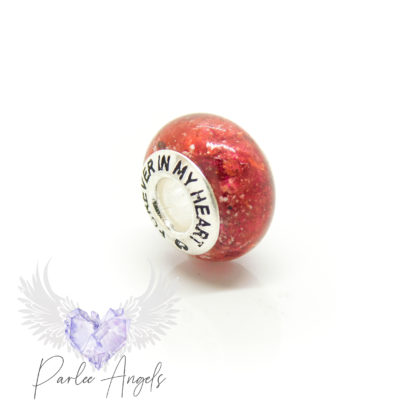 Silver bead, cremation ashes with dragon's blood red resin sparkle mix. Solid 925 stamped silver Forever In My Heart bead core. Medium shaped bead